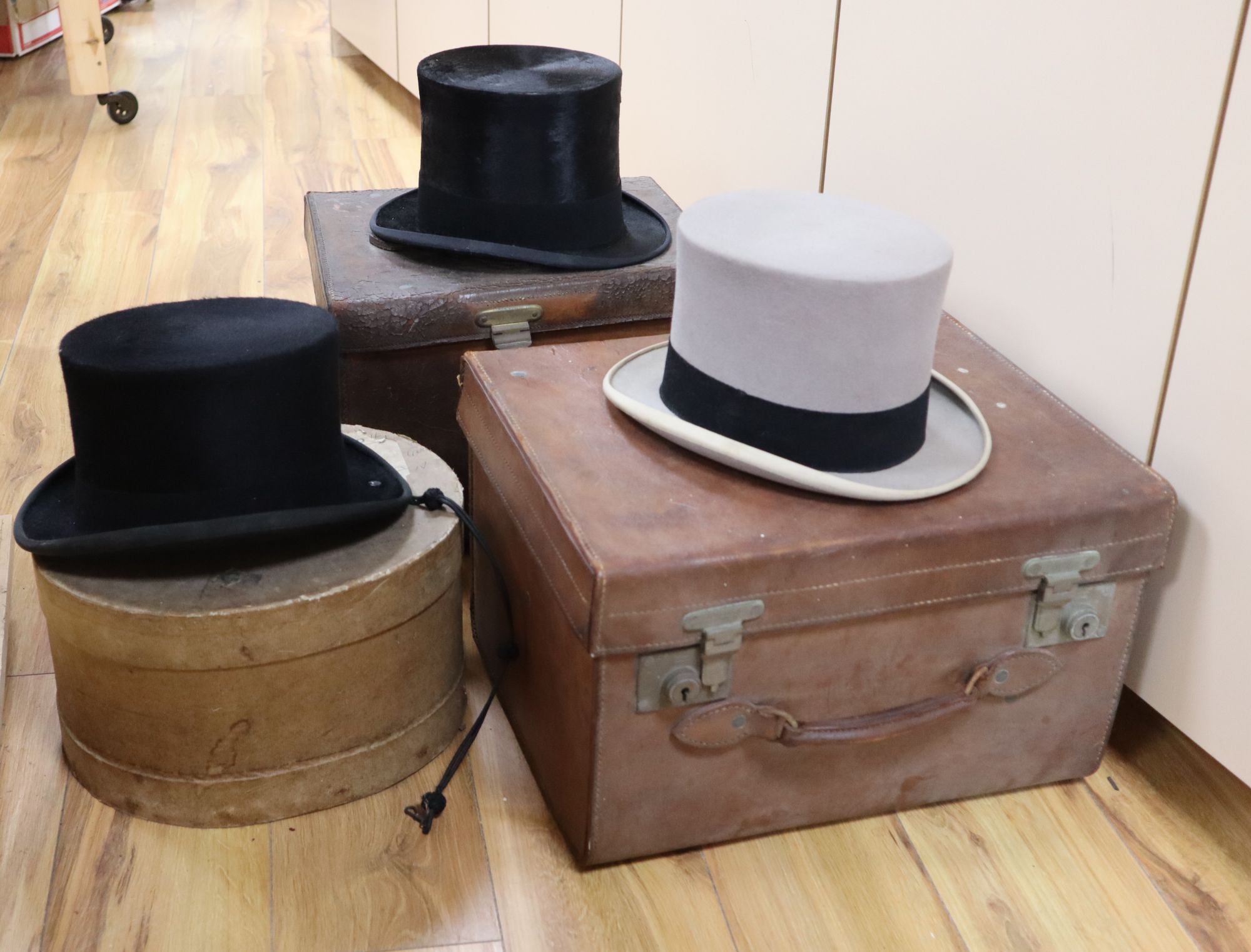 Four Victorian Locke & Co silk top hats